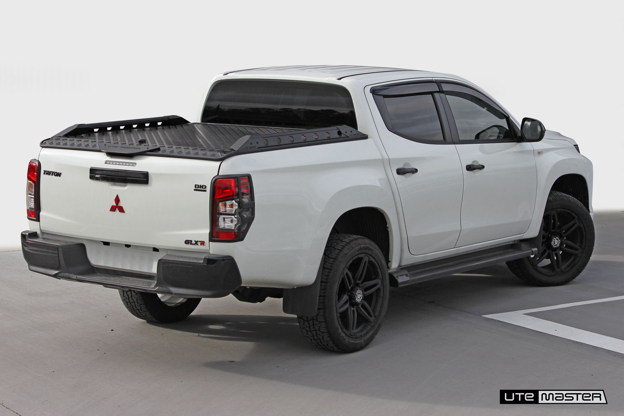 MitsubishiTriton Hard Lid_Black and White_Load-Lid by Utemaster Roller Shutter and Tonneau Cover Alternative